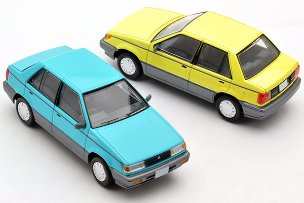 Mô hình xe Tomyca Limited Vintage TLV 1:64 Isuzu Gemini Patio (yellow) | LV-N125b
