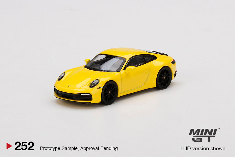 Mô hình xe Mini GT 1:64 Porsche 911 Carrera 4S Racing Yellow - MGT00252