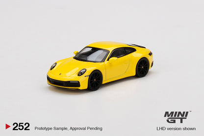 Mô hình xe Mini GT 1:64 Porsche 911 Carrera 4S Racing Yellow - MGT00252