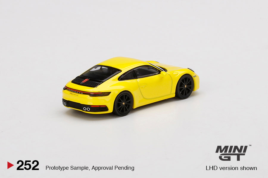 Mô hình xe Mini GT 1:64 Porsche 911 Carrera 4S Racing Yellow - MGT00252