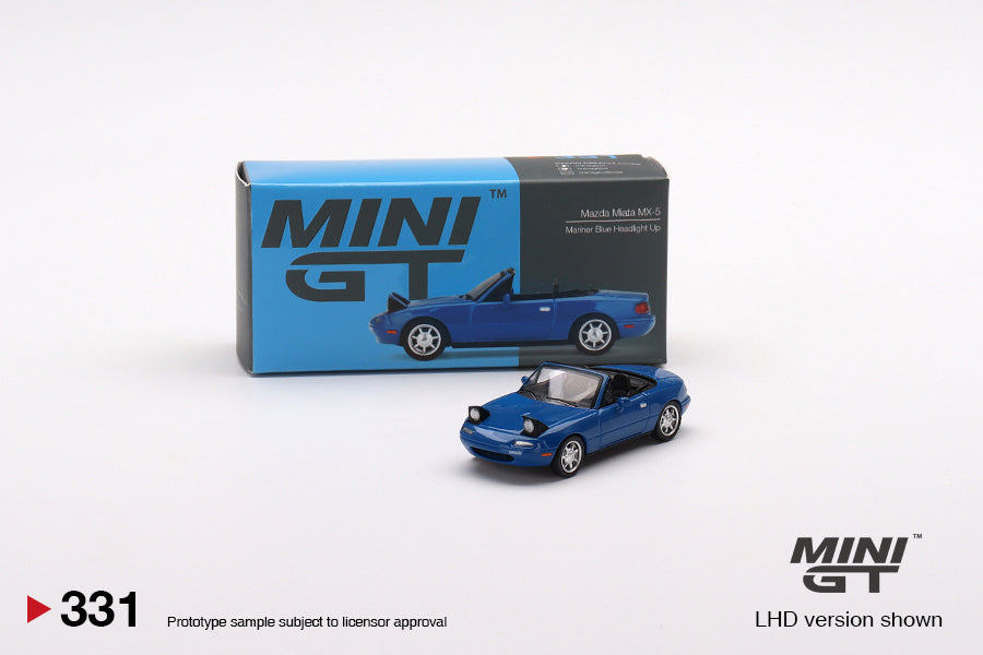 Mô hình xe Mini GT 1:64 Mazda Miata MX-5 (NA) Mariner Blue Headlight Up LHD - MGT00331-L