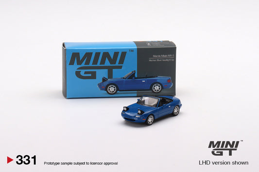Mô hình xe Mini GT 1:64 Mazda Miata MX-5 (NA) Mariner Blue Headlight Up LHD - MGT00331-L