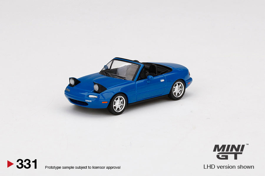 Mô hình xe Mini GT 1:64 Mazda Miata MX-5 (NA) Mariner Blue Headlight Up LHD - MGT00331-L