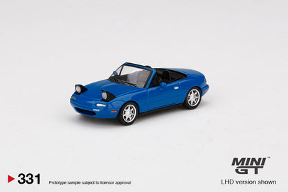 Mô hình xe Mini GT 1:64 Mazda Miata MX-5 (NA) Mariner Blue Headlight Up LHD - MGT00331-L