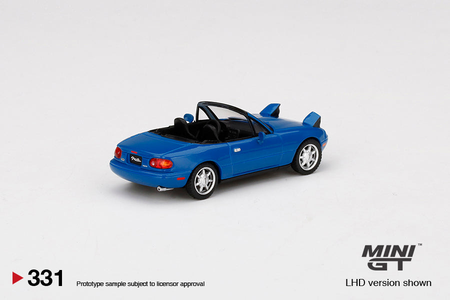 Mô hình xe Mini GT 1:64 Mazda Miata MX-5 (NA) Mariner Blue Headlight Up LHD - MGT00331-L