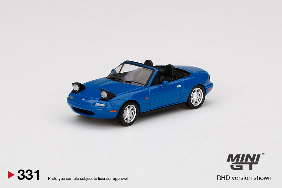 Mô hình xe Mini GT 1:64 Eunos Roadster Mariner Blue Headlight Up - MGT00331-R