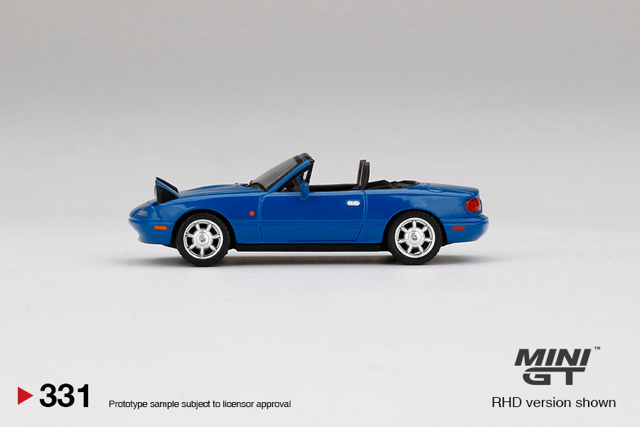 Mô hình xe Mini GT 1:64 Eunos Roadster Mariner Blue Headlight Up - MGT00331-R