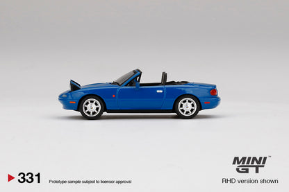 Mô hình xe Mini GT 1:64 Eunos Roadster Mariner Blue Headlight Up - MGT00331-R