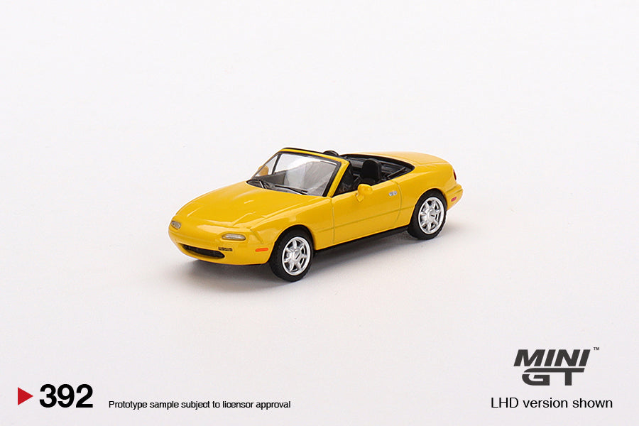 Mô hình xe Mini GT 1:64 Mazda Miata MX-5 (NA) Sunburst Yellow - MGT00392