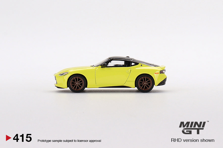 Mô hình xe Mini GT 1:64 Nissan Z Proto Spec 2023 Ikazuchi Yellow - MGT00415