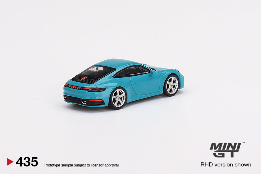 Mô hình xe Mini GT 1:64 Porsche 911 (992) Carrera S Miami Blue - MGT00435