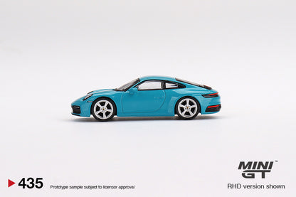 Mô hình xe Mini GT 1:64 Porsche 911 (992) Carrera S Miami Blue - MGT00435