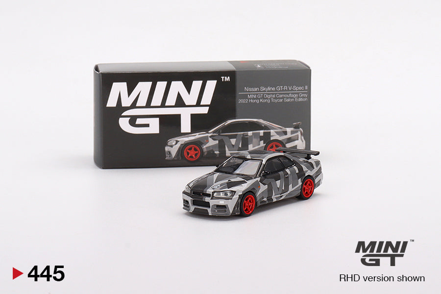 Mô hình xe Mini GT 1:64 Nissan Skyline GT-R (R34) V-Spec II MINI GT Digital Camouflage Grey 2022 Hong Kong Toycar Salon Edit - MGT00445