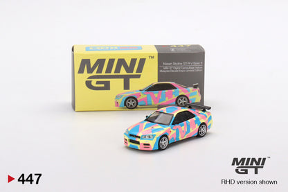 Mô hình xe Mini GT 1:64 Nissan Skyline GT-R (R34)V-Spec ll MINI GT Digital Camouflage Yellow - MGT00447