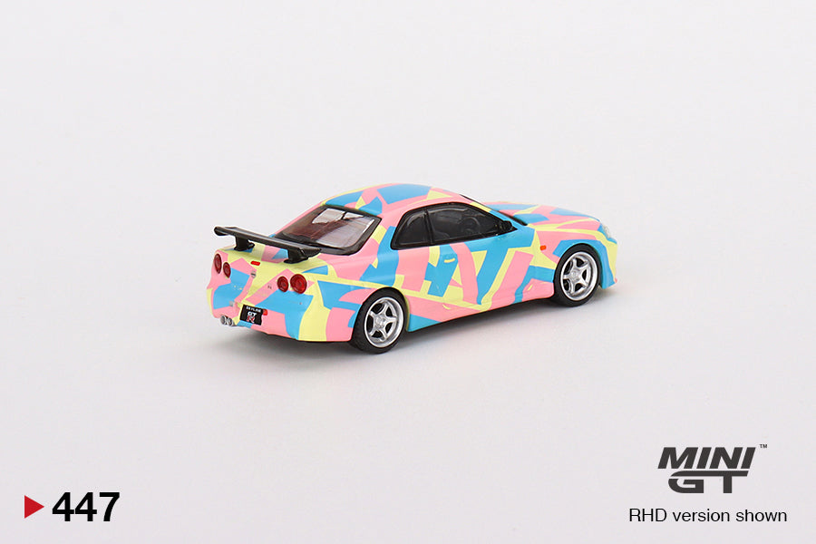 Mô hình xe Mini GT 1:64 Nissan Skyline GT-R (R34)V-Spec ll MINI GT Digital Camouflage Yellow - MGT00447