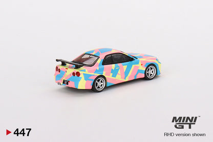 Mô hình xe Mini GT 1:64 Nissan Skyline GT-R (R34)V-Spec ll MINI GT Digital Camouflage Yellow - MGT00447