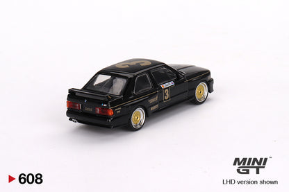 Mô hình xe Mini GT 1:64 BMW M3 #3 JPS Team BMW 1987 ATCC Championship Winner - MGT00608