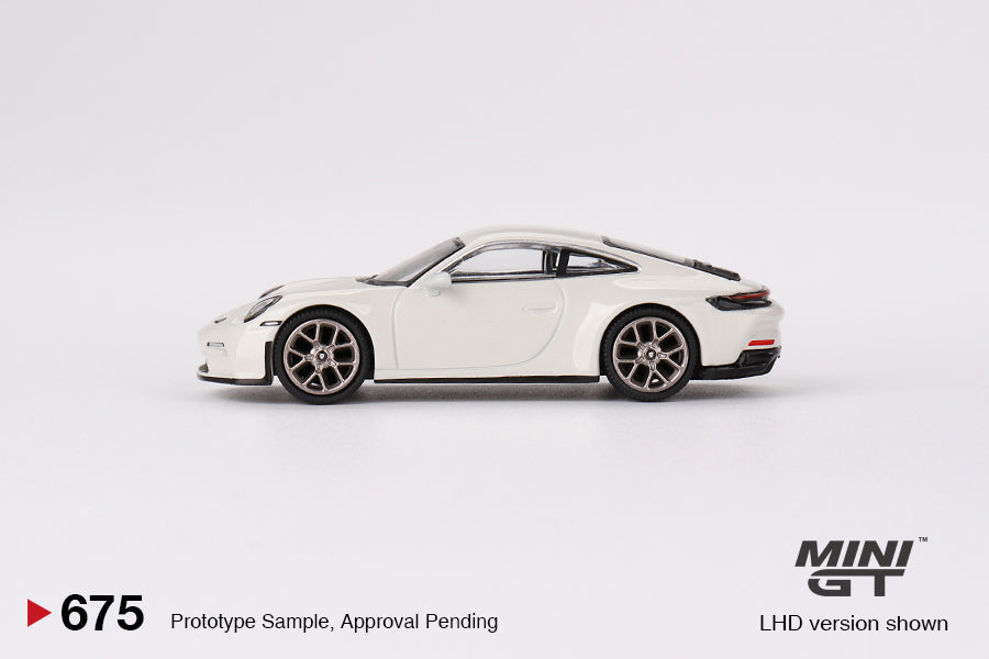 Mô hình xe Mini GT 1:64 Porsche 911 (992) GT3 Touring Crayon - MGT00675
