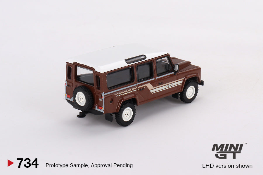 Mô hình xe Mini GT 1:64 Land Rover Defender 110 1985 County Station Wagon Russet Brown - MGT00734