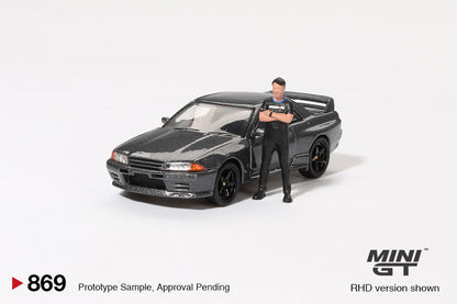Mô hình xe Mini GT 1:64 Nissan Skyline GT-R (R32) Gunmetal W/ Matsuda Figure Tsugio Matsuda Collection - MGT00869