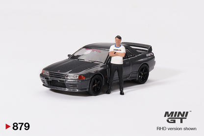 Mô hình xe Mini GT 1:64 Nissan Skyline GT-R (R32) Gunmetal W/ Matsuda Figure Tsugio Matsuda Collection No.3 TAS 2025 Exclusive - MGT00879