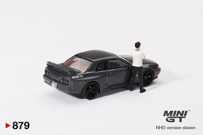 Mô hình xe Mini GT 1:64 Nissan Skyline GT-R (R32) Gunmetal W/ Matsuda Figure Tsugio Matsuda Collection No.3 TAS 2025 Exclusive - MGT00879