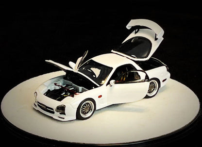 Mô hình xe PGM 1:64 Mazda RX-7 (FD3S) in White Luxury Round Base Version / PGM-640803B