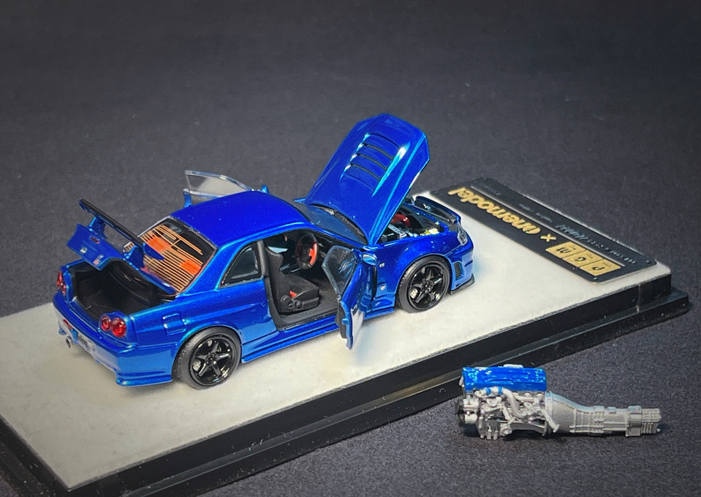 Mô hình xe PGM 1:64 Nissan Skyline GT-R (R34) in Bayside Blue Regular Version / PGM-641002A