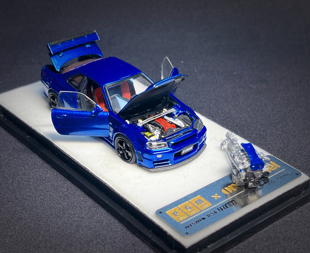 Mô hình xe PGM 1:64 Nissan Skyline GT-R (R34) in Bayside Blue Regular Version / PGM-641002A