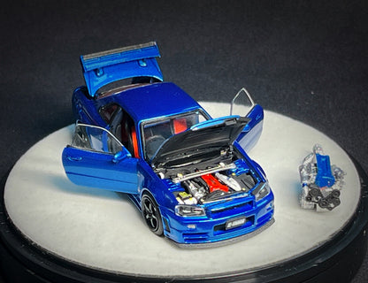 Mô hình xe PGM 1:64 Nissan Skyline GT-R (R34) in Bayside Blue Luxury Version / PGM-641002B