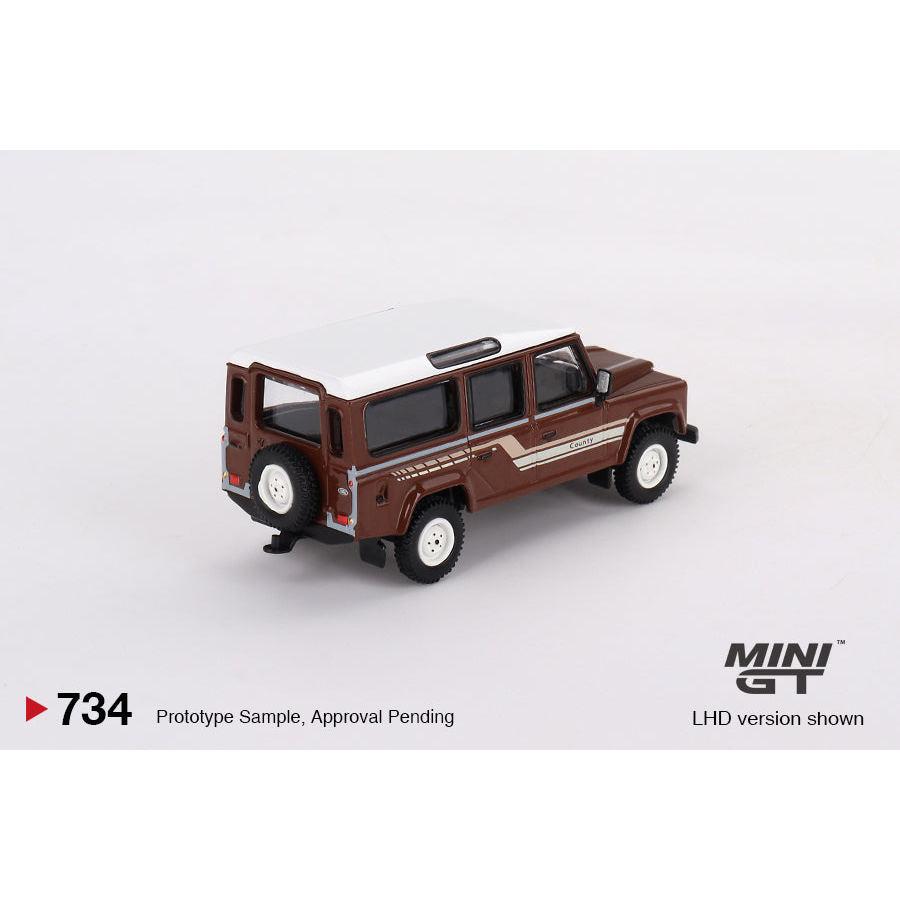 [HÀNG CÓ SẴN] Mocus Mô hình xe Mini GT 1:64 Land Rover Defender 110 1985 County Station Wagon Russet Brown 734